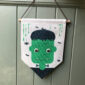 Frankenstein Halloween Flag with glow in the dark googly eyes for a Halloween Party.