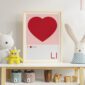 love heart framed print on a shelf in a cool nursery